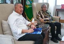 Pj Sekdaprov Sumut Terima Laporan Kinerja Komisi Informasi
