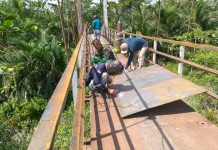 Kodim 0208/AS Rampungkan Perbaikan Jembatan Gantung Desa Jati Mulia