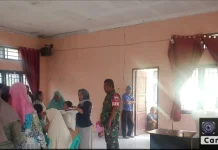 Babinsa 07/Salak Kawal Bantuan Pangan di Pakpak Bharat