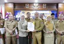 Wali Kota Tanjungbalai Serahkan SPPT PBB dan PKB 2026