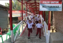 Polres Tanjungbalai Serahkan Jembatan Merah Putih