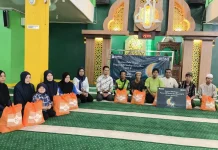 Bagi Sembako, BNI Merauke Sambangi Pasar Wamanggu