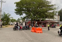 Sat Lantas Polres Aceh Jaya Atur Arus Lalu Lintas Persimpangan Padat Kenderaan