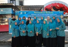 TP PKK Aceh Barat Bagikan 500 Cup Kanji Rumbi kepada Masyarakat
