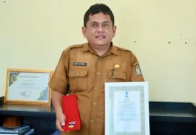 Dedy Jefernal Raih Penghargaan Dharma Persandian dari BSSN