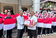 Pemkab Nagan Raya Bagikan 3.000 Bendera Merah Putih ke Masyarakat