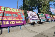 Bupati Sokhiatulo Laia Pimpin Upacara Peringatan Hari Pramuka Kwarcab Nisel