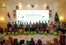 Baznas Padang Panjang Salurkan Bantuan Ramadan