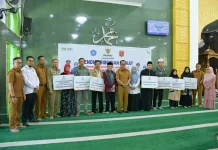 Ratusan Mustahik di Agam Terima Bantuan Zakat