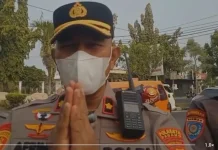 Polsek Koto Tangah Bagikan Masker di Simpang Tabing