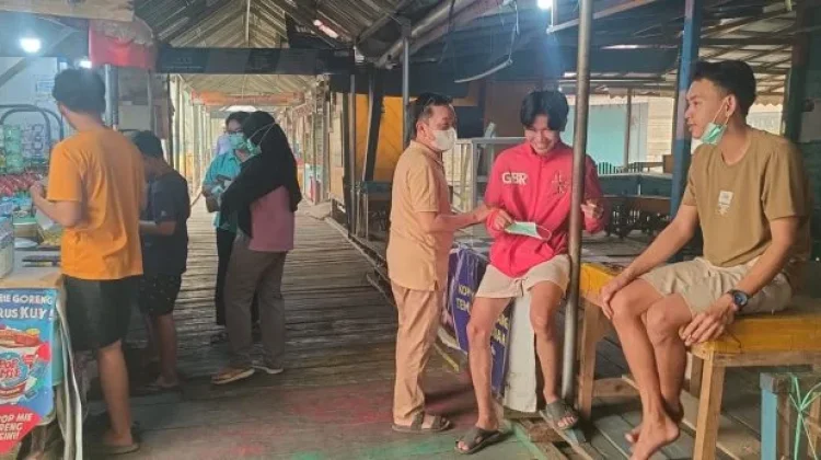 Dinkes Palangka Raya Membagikan Masker di Lokasi Objek Wisata