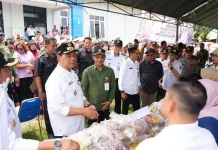 Bupati Barito Utara Luncurkan Gerakan Pangan Murah On The Road di Gunung Timang