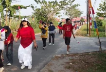 Warga Kompleks Perumahan Palangka Raya Menggelar Jalan Sehat Berhadiah Sembako