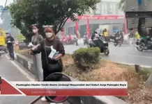 Kabut Asap, Warga Turun Bagikan Masker dan Vitamin kepada Sesama Warga