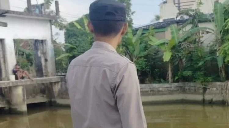 Polsek Pemulutan Lakukan Pemantauan Debit Air Sungai