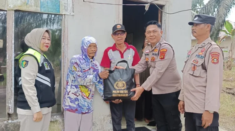 Polsek Pulau Rimau Salurkan Bansos dan Layanan Kesehatan Gratis