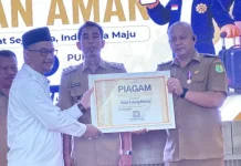 Desa Tebing Bulang Raih Penghargaan Migran Emas Produktif