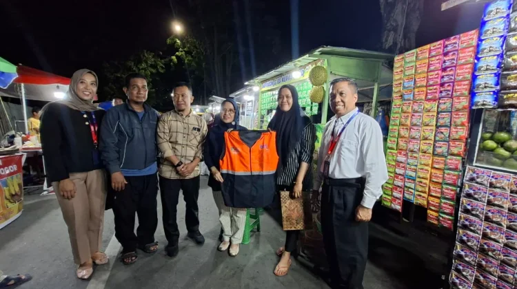 Pemkot Palu dan Bank BTN Bagikan Rompi bagi UMKM Dorong Transaksi Digital