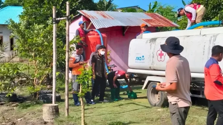 Atasi Banjir Kasimbar, BPBD Parimo Salurkan Air Bersih dan Normalisasi Sungai