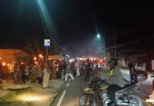 Ratusan Warga Parimo Meriahkan Pawai Obor Sambut Ramadan 1447 H