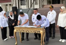 Lindungi Anggota KORPRI, Ketua Korpri Palu Teken MoU dengan BPJS Ketenagakerjaan