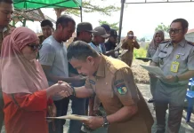 Wali Kota Palu Serahkan 180 Sertifikat Huntap