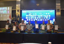 Resmikan Sentra KI, Kemenkum Sulteng Teken 48 PKS Bersama Pemda dan Kampus