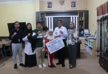 Wabup Poso Tegaskan Komitmen Perlindungan Non ASN lewat Santunan dan Beasiswa