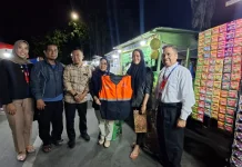 Pemkot Palu dan Bank BTN Bagikan Rompi bagi UMKM Dorong Transaksi Digital
