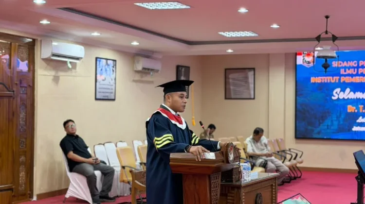 Camat Marpoyan Damai Raih Gelar Doktor IPDN dengan Predikat Sangat Memuaskan