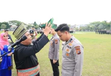 Polda Riau Luncurkan Penggunaan Tanjak dan Selempang