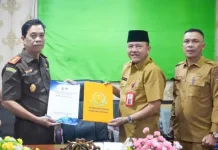 Penguatan Hukum, Diskominfoss dan Kejarai Kuansing Tandatangani PKS