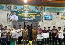 Bupati Kampar Serahkan Santunan Kematian BPJS Ketenagakerjaan kepada Ahli Waris