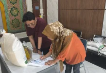 Bulog Salurkan Bantuan Pangan di Kelurahan Kota Tinggi Pekanbaru