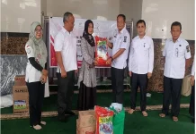 Ratusan Warga Rentan di Kampar Terima Bansos Atensi Sentra Abiseka Kemensos RI
