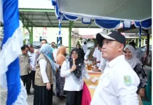 Pemkab Siak dan Bulog Salurkan Bantuan Pangan bagi 30.786 KPM