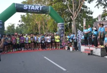 Bupati Kampar Lepas Peserta Fun Run Road To Riau Bhayangkara Run 2026
