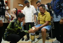 Bupati Kampar Serahkan Bantuan Disabilitas dan ATENSI