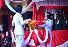 Wabup Misharti Pimpin Penurunan Bendera