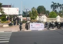 Komunitas Motor Poseidon Pekanbaru Bagikan Seribu Masker