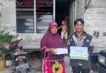 IZI Salurkan 300 Paket Fidyah kepada Masyarakat Membutuhkan di Pekanbaru