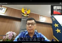 Jaga Kedisiplinan Pegawai, Kakanwil Kemenkum Riau Pimpin Apel Jumat Pagi Virtual