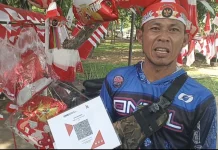 Penjual Bendera Merah Putih Mulai Sediakan QRIS, Layani Pembeli Non-Tunai