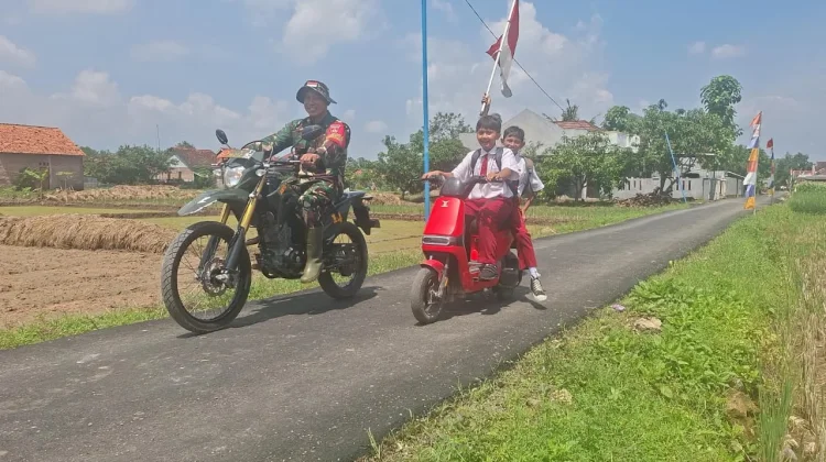 Jalan Baru TMMD Permudah Akses Siswa Desa Cikuya