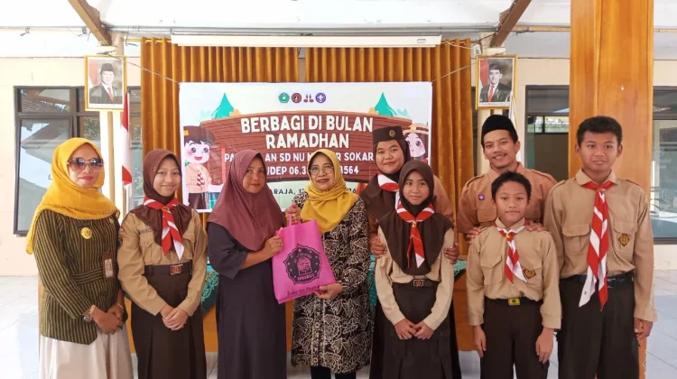 Pramuka SD NU Master Sokaraja Salurkan Ratusan Paket Sembako