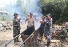 Satgas TMMD 127 dan Warga Percepat Pengaspalan Jalan