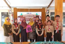 Pramuka SD NU Master Sokaraja Salurkan 625 Paket Sembako ke 18 Desa