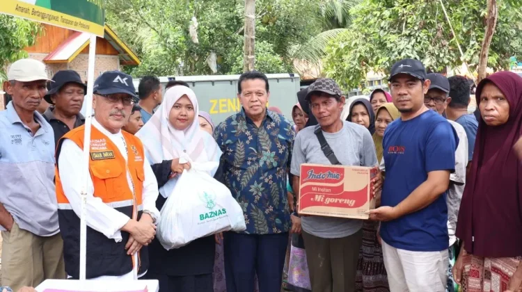 Baznas Agam Salurkan Sembako untuk 358 KK Penyintas di Huntara