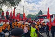 May Day  di tengah Ancaman PHK