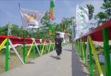 Sedekah Konsumen Alfamart melalui BAZNAS Bangun Jembatan Warga Sukabumi
